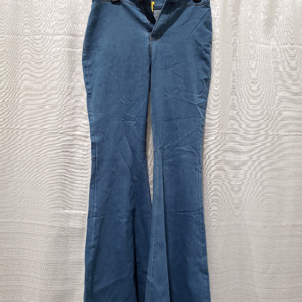 Blue denim bell bottom jeans. S,M, and XL.